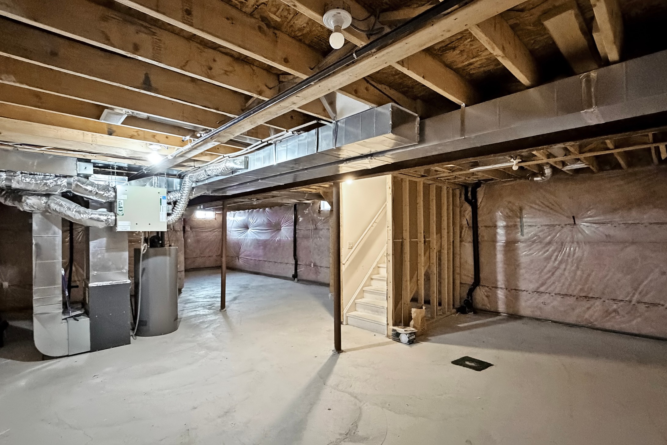 Unfinished basement with separate entrance — massive future potential