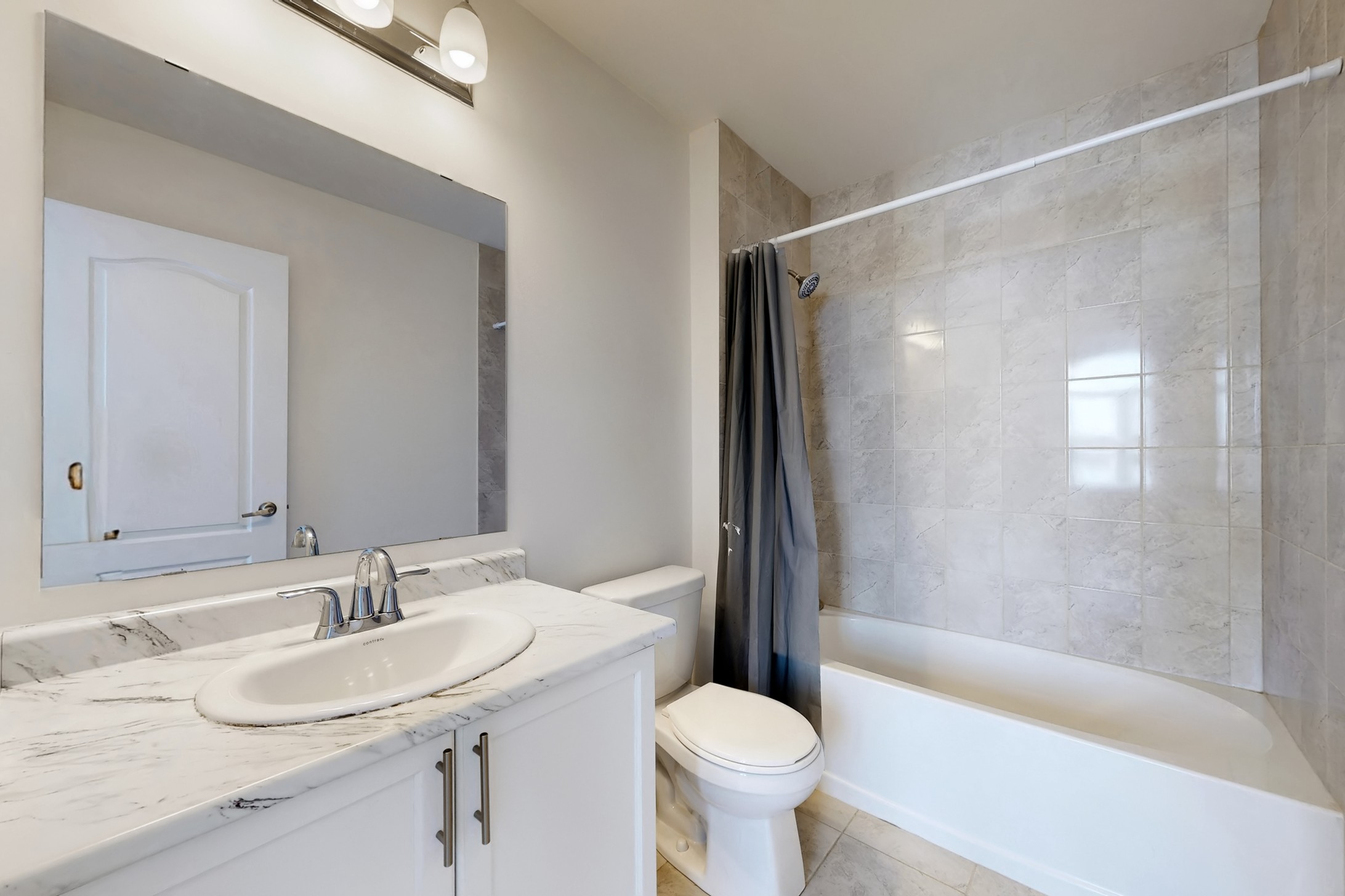 Second floor bathroom with tub and shower