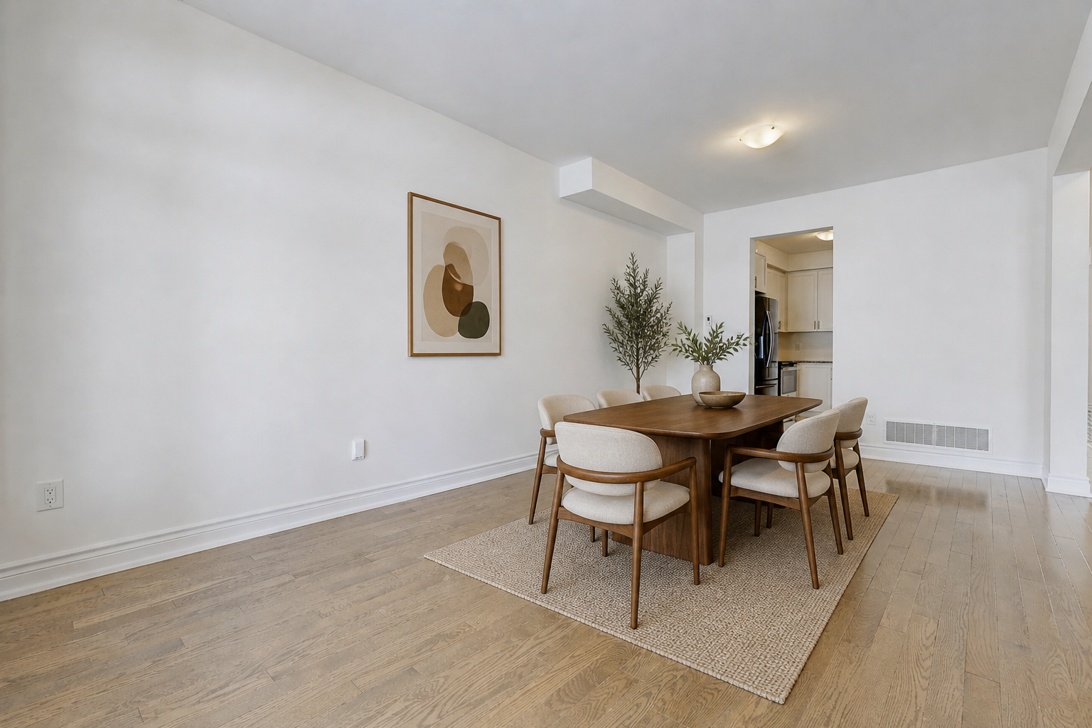 Dining area combined with living, hardwood floors